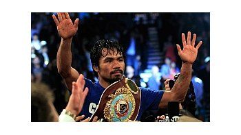 El filipino Manny Pacquiao retuvo la corona welter del OMB ante el estadounidense Shane Mosley.