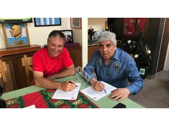 Ariel Holan y Hugo Moyano.