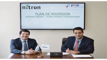 ámbito.com | Acuerdo. Javier Urrutia, presidente de Nitron, y su par de PTP Group, Guillermo Misiano, en la firma del convenio.