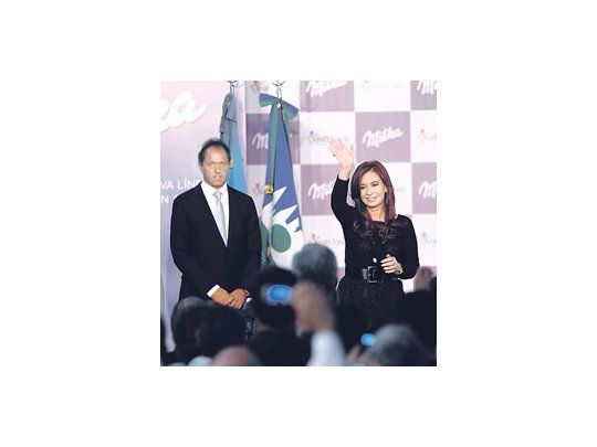 Pacíficos ayer en público, Cristina de Kirchner y Daniel Scioli.