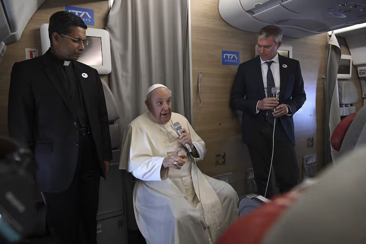 Pope Francis during the press conference on the plane. Pope Francis during the press conference on the plane.