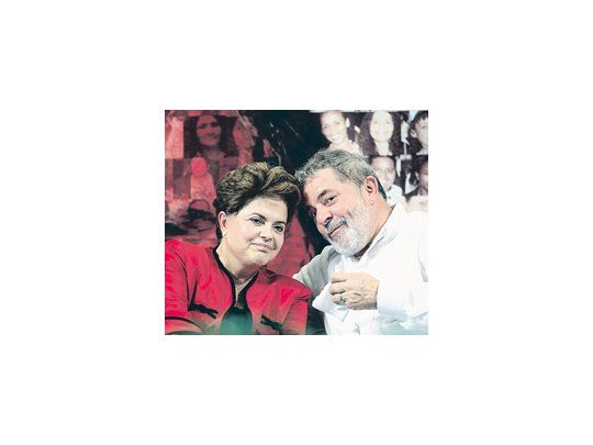 Luiz Inácio Lula da Silva y Dilma Rousseff, en una foto previa a la Navidad. El sábado, el primero le dejará la presidencia a la segunda, quien deberá lidiar con la amplia sombra de su mentor.