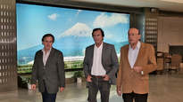 Roberto García junto a dos históricos de Ámbito: Luis Beldi y Julios Ramos.