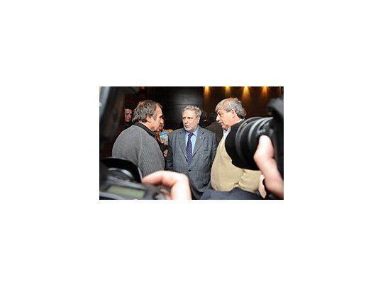 El senador Carlos Reutemann junto a los titulares de CRA, Mario Llambías y su par de la Federación Agraria, Eduardo Buzzi.