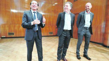 trío. Sica, Dujovne y Dietrich ayer, en el brindis con periodistas.