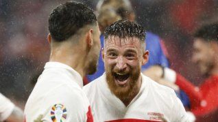 Turco en la llovizna. Bajo el agua de Munich Turquía le ganó a Austria y se metió en los cuartos de final.&nbsp;