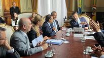 Oscar Herrera Ahuad junto al embajador argentino en Brasil, Daniel Scioli, y el gobernador de Río Grande Do Sul, Eduardo Leite.