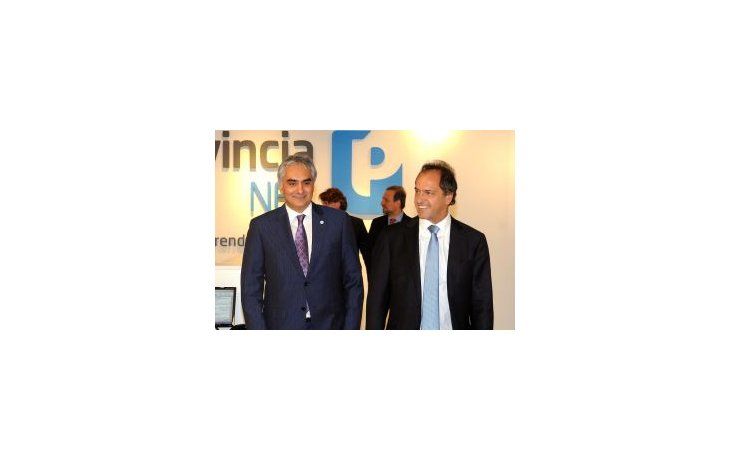 Santiago Montoya y Daniel Scioli.