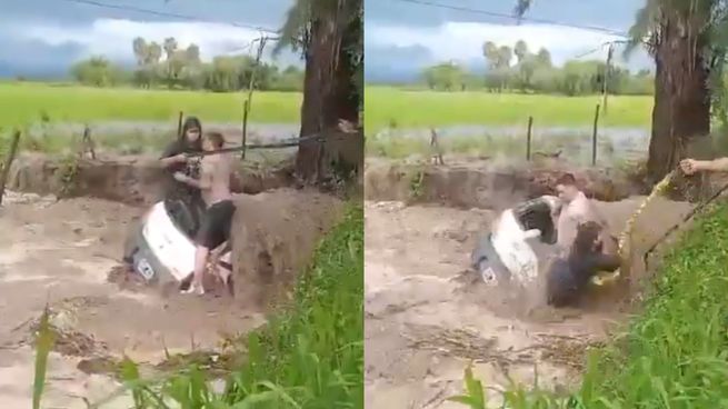 Vecinos asistieron a una pareja de turistas bonaerenses cuyo auto cayó a un canal desbordado en medio del fuerte temporal en Salta.
