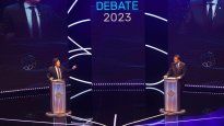 Sergio Massa y Javier Milei, frente a frente en el último debate.