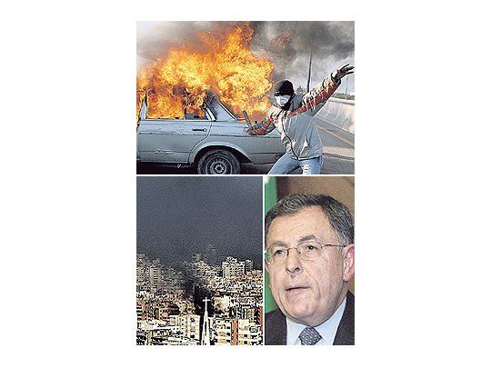 Líbano revivió ayerescenas de su guerra civilde 15 años, en el intentode Hizbollah por derribaral premier pro occidentalFuad Siniora (arriba y abajo).Los piquetes eincendios (izquierda)ennegrecieron elcielo de Beirut (abajo).