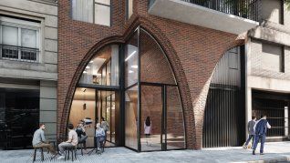 La entrada de Mine Ayacucho se destaca con una bóveda de ladrillo en doble altura. Este diseño busca marcar la transición elegante entre el espacio urbano y el ámbito residencial privado La entrada de Mine Ayacucho se destaca con una bóveda de ladrillo en doble altura. Este diseño busca marcar la transición elegante entre el espacio urbano y el ámbito residencial privado