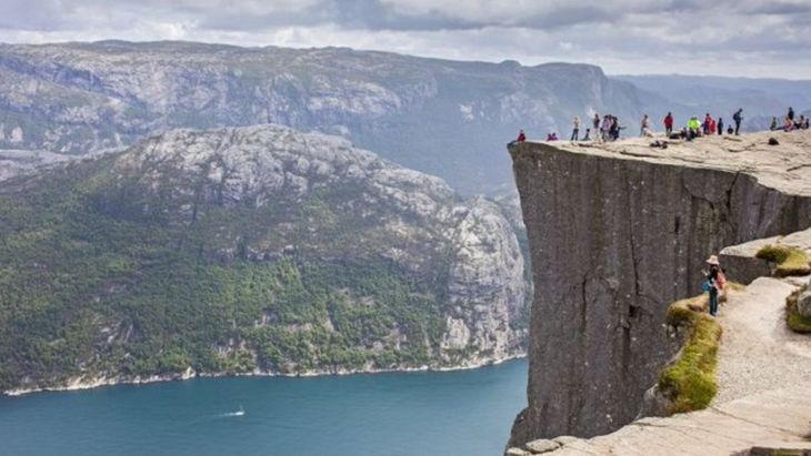 The Preikestolen cliff is located on the southwestern coast of Norway. The Preikestolen cliff is located on the southwestern coast of Norway.