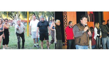 Carlos Soria y su candidato a vice, Alberto Weretilneckm, juegan al tejo durante una visita de campaña en el interior provincial. El radical Barbeito recaló en General Roca para cerrar la campaña de cara al domingo.