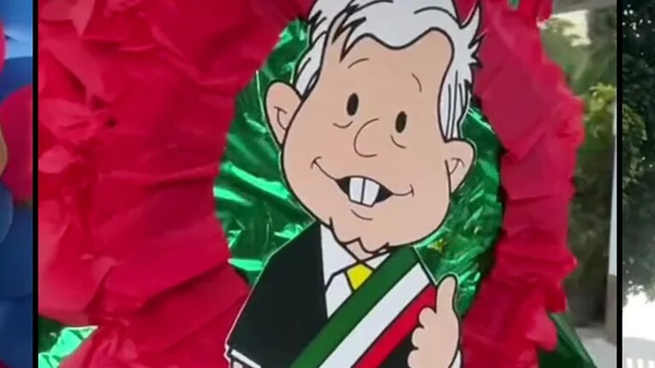 La piñata con la caricatura del presidente AMLO