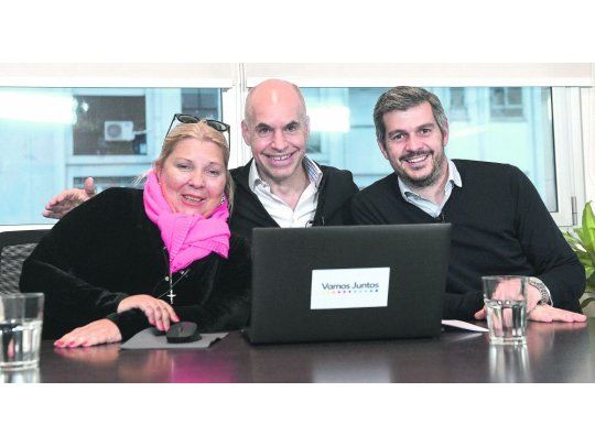 En vivo. Elisa Carrió, Marcos Peña y Horacio Rodríguez Larreta vía Facebook, ayer en Capital.