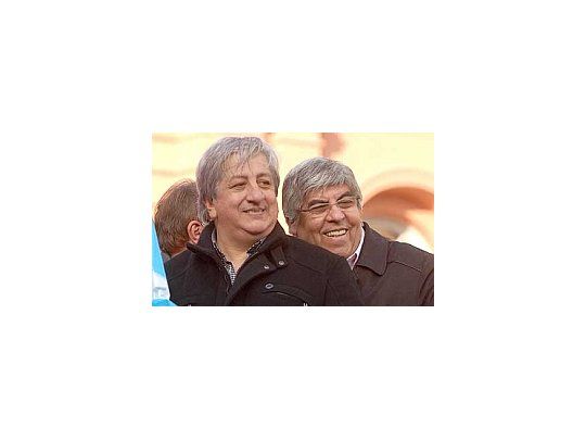 Piumato, junto a Moyano.