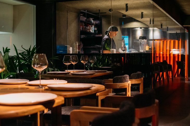 His kitchen in sight on the second floor provides transparency and connection between the chef and the diners. His kitchen in sight on the second floor provides transparency and connection between the chef and the diners.