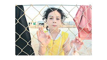 Una refugiada siria es registrada en un campamento de la ciudad jordana de Mafraq. La ONU estimó que son dos millones los desplazados internos en el país árabe.