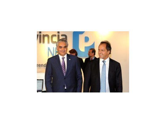 Santiago Montoya y Daniel Scioli.