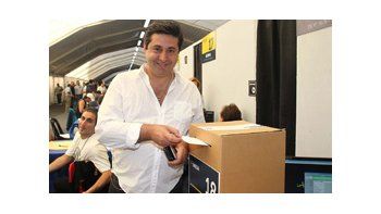 Daniel Angelici, el día de la votación. El plantel se repartirá el premio.