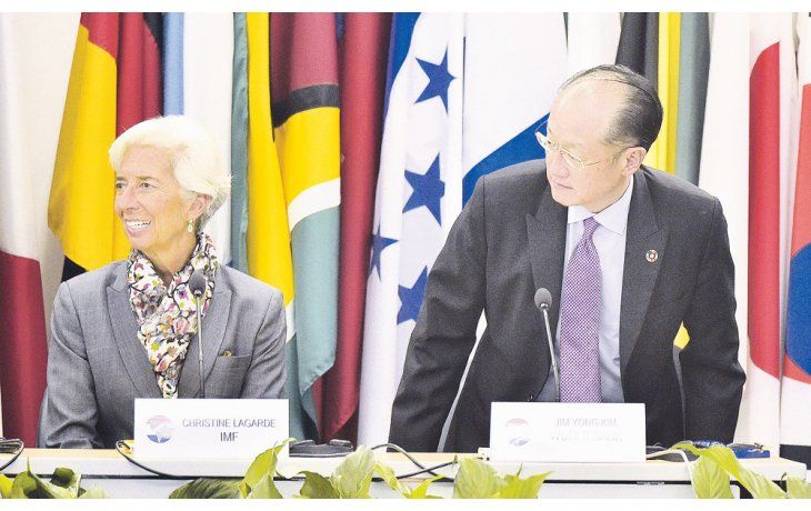 Pareja. Christine Lagarde (FMI) y Jim Yong Kim (BM), en cumbre conjunta.