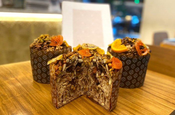 Their sweet bread stands out for a syrup coating with caramelized nuts and orange slices. Their sweet bread stands out for a syrup coating with caramelized nuts and orange slices.