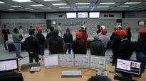 Los funcionarios durante el recorrido en el predio de la ciudad de Lima.&nbsp;