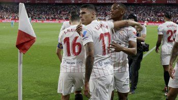 Erik Lamela anotó en Sevilla, que no pudo sostener los dos goles de ventaja y perdió con Real Madrid en la Liga española.