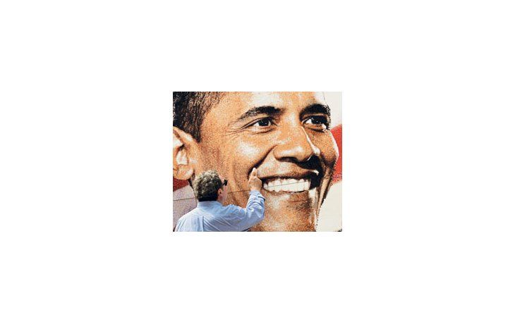 ámbito.com | Un periodista observa la instalación de una obra artística colectiva con el rostro de Barack Obama. Del Big Picture Project participaron mil alumnos de cuarto grado.
