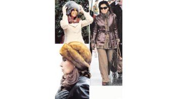 ámbito.com | En Rusia, Cristina de Kirchner usó gorros estilo cosaco y otra vez escondió su mirada bajo grandes lentes oscuros.