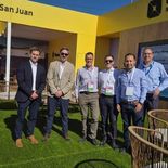 Representantes del banco y de la unidad minera durante la exposición internacional en San Juan. Representantes del banco y de la unidad minera durante la exposición internacional en San Juan.