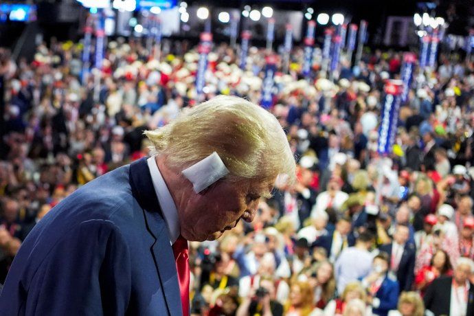 Donald Trump at the Republican National Convention in Milwaukee, after being shot during a campaign rally. Donald Trump at the Republican National Convention in Milwaukee, after being shot during a campaign rally.