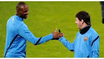 Abidal y Messi, cuando eran compañeros en Barcelona.