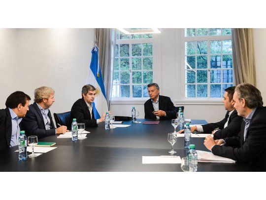 El mandatario Mauricio Macri junto al jefe de Gabinete Marcos Peña y el ministro del Interior Rogelio Frigerio.