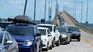 Long lines of cars are reported to cross from Uruguay to Argentina.