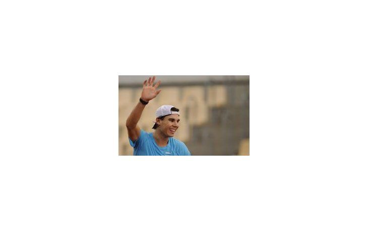 Sonrisa. Rafael Nadal mostró alegría en su visita a niños en Barcelona.