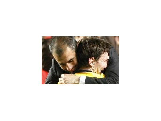 El DT y su jugador preferido.