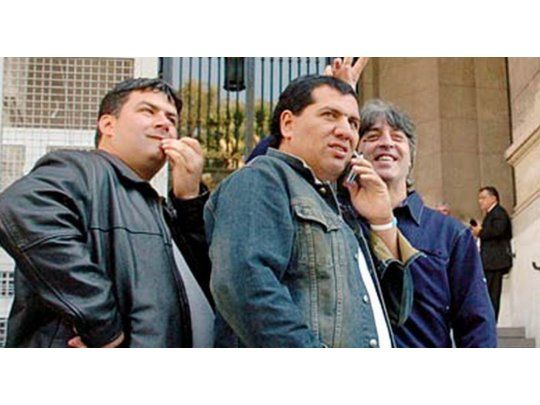 Pereyra (en el medio) fue asesinado en su casa.