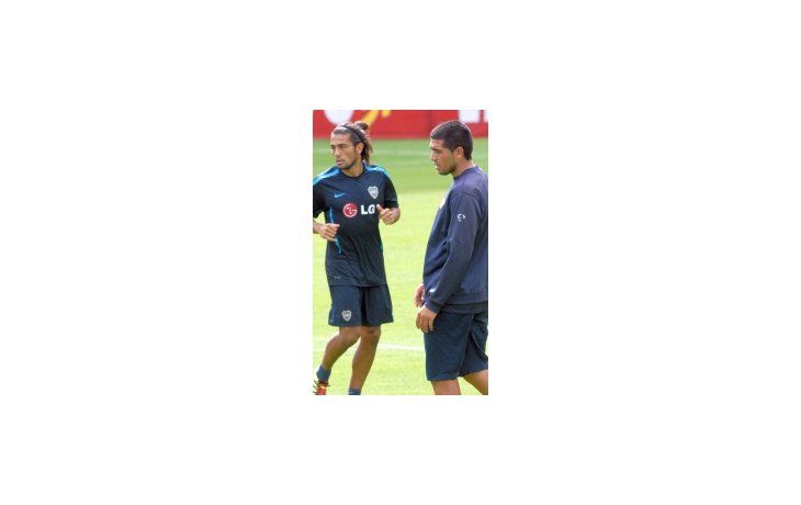 Erviti y Riquelme juntos en un entrenamiento de Boca.