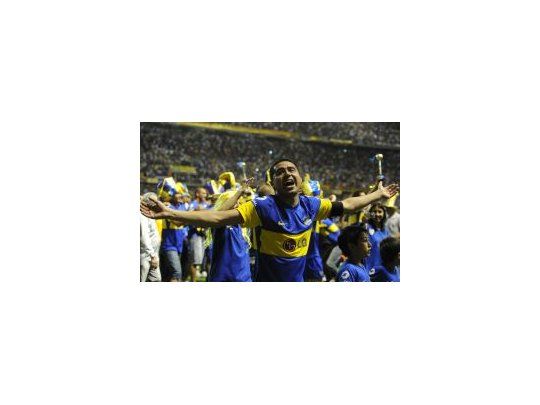 Feliz. Riquelme celebra su décimo título en Boca.