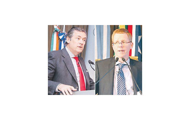Dos miradas. Las de Enrique Cristofani y Juan Curuchet.