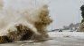 Waves crash on the coast of Sansha City as Typhoon Gaemi approaches in Fujian Province, China. 