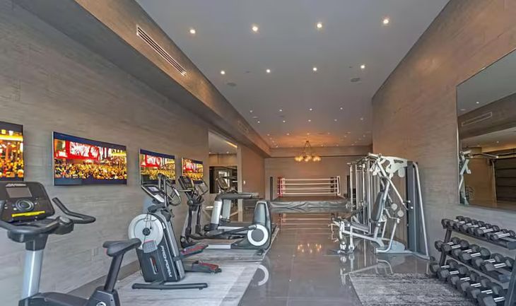 The house has a gym, movie theater, basketball court and more. The house has a gym, movie theater, basketball court and more.
