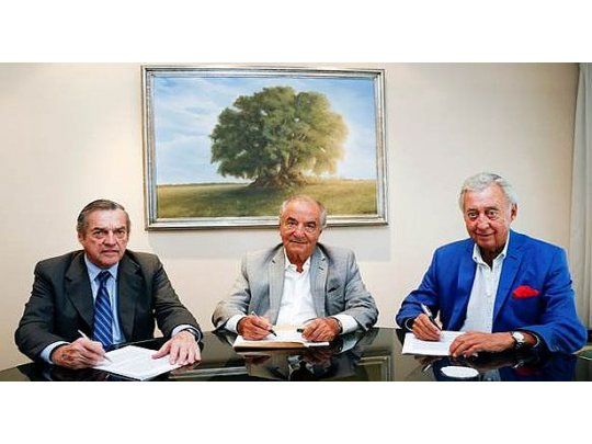 Carlos De la Vega (CAC), Armando Cavalieri (FAESyC) y Osvaldo Cornide (CAME).