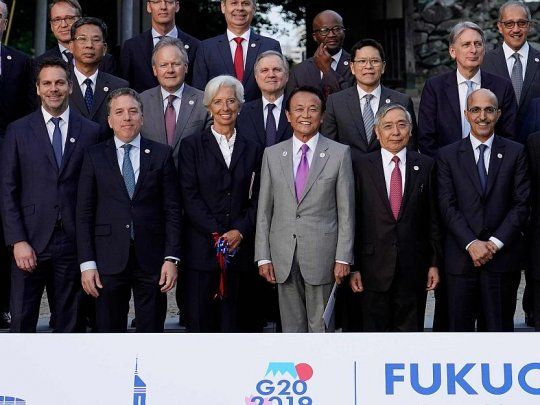 El ministro de Hacienda, Nicolás Dujovne, y el presidente del BCRA, Guido Sandleris, junto a la titular del FMI, Christine Lagarde.