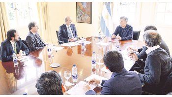 Explicaciones. Mauricio Macri abrió ayer Olivos para escuchar la versión del directorio del BCRA sobre la inflación y el sistema financiero.