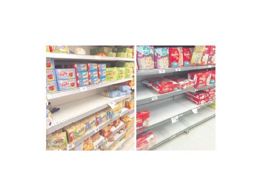 En la cadena de Carrefour se podían ver espacios vacíos en la sucursal de Barracas. La escena se repetía en su competidor Coto de San Telmo .