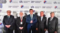 José Ignacio de Mendiguren y Sergio Massa en una conferencia de la UIA.