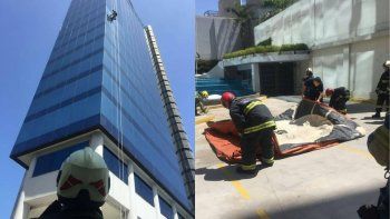 Susto en Puerto Madero: un limpiavidrios quedó atrapado en un sexto piso y fue rescatado por bomberos